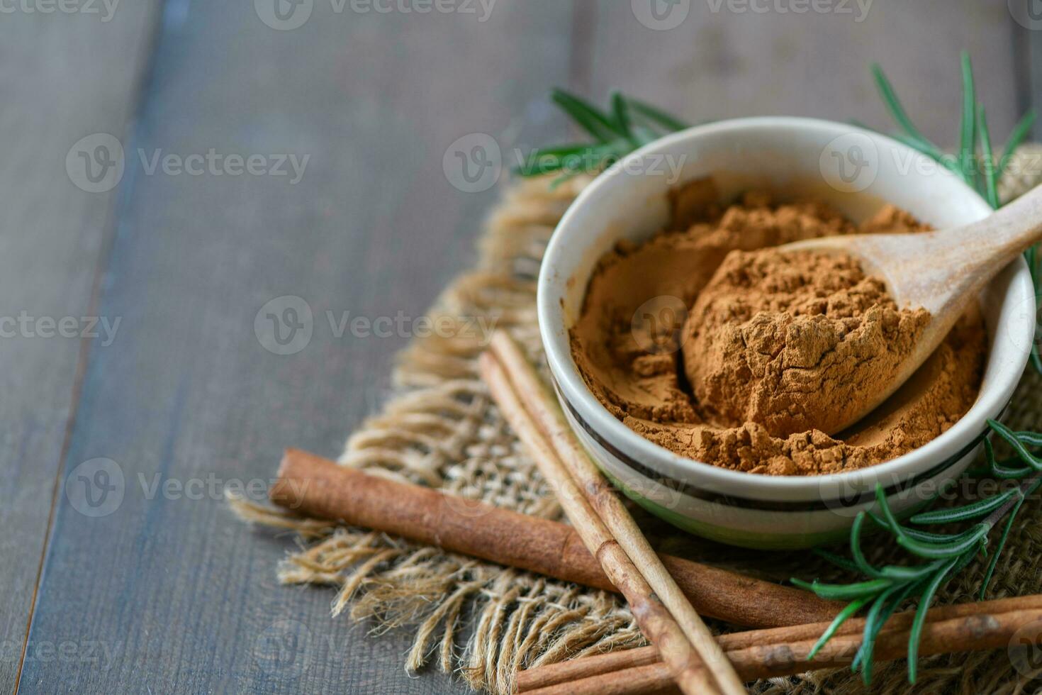 cinnamon powder in bowl Cinnamon is rich in antioxidants. photo