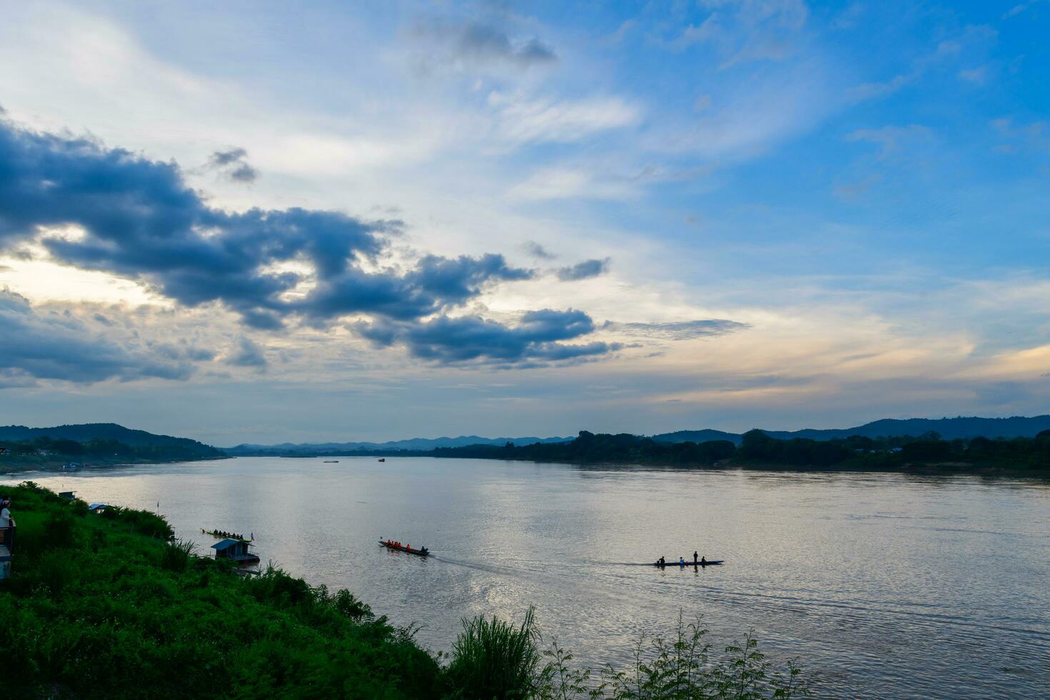 Landscape of classic wooden house on evening beside the Mekong river in Chiang Khan district, Loei. photo