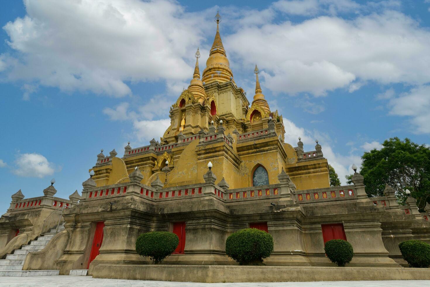 The golden pagoda in Buddhadhiwat Temple. Located in Betong Yala, Thailand, travel photo