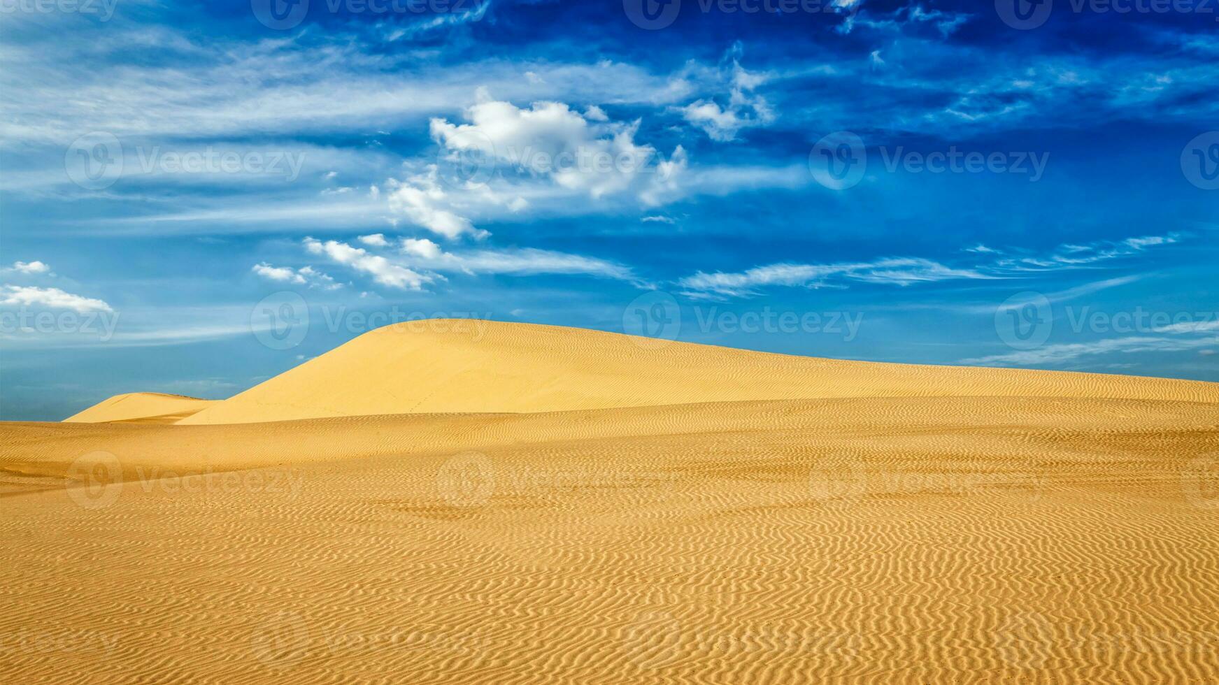 Desert sand dunes on sunrise photo