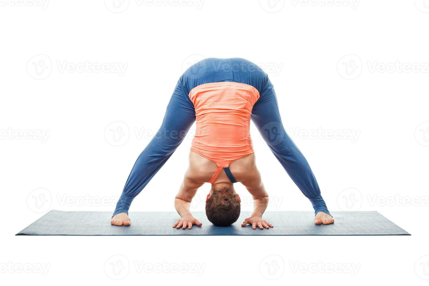 Woman doing yoga asana Prasarita padottanasana photo