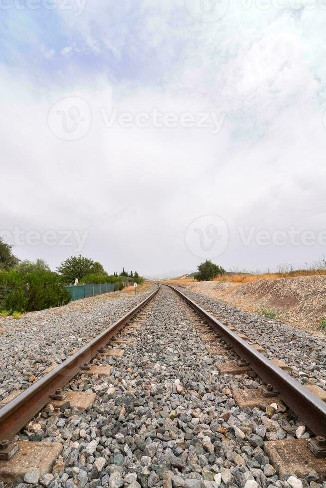 railroad tracks in the desert photo