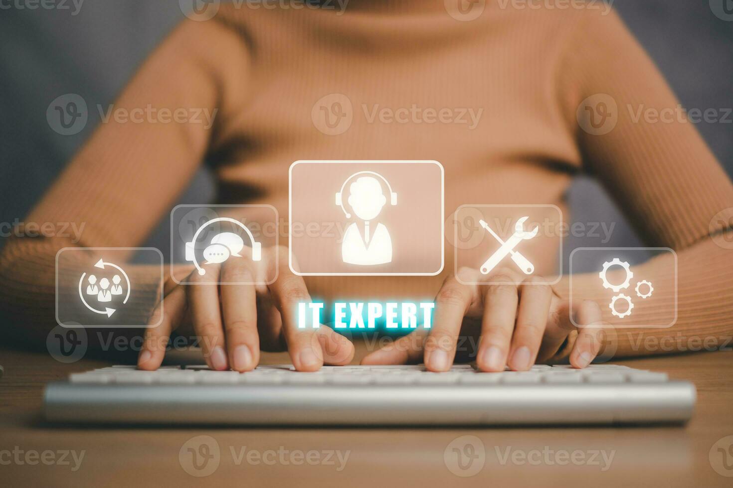 IT expert concept, Person hand typing keyboard computer with IT expert icon on virtual screen, Information Technology Advice or Services. photo