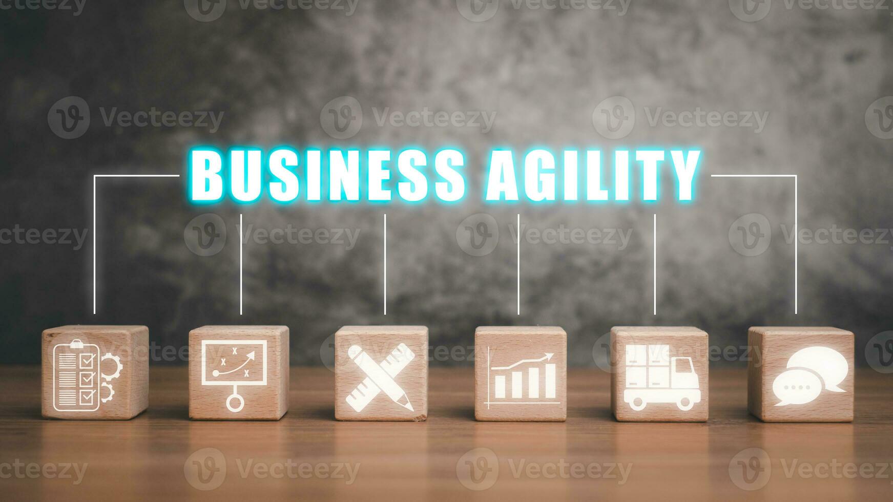 Business agility concept, Wooden block on desk with business agility icon on virtual screen. photo