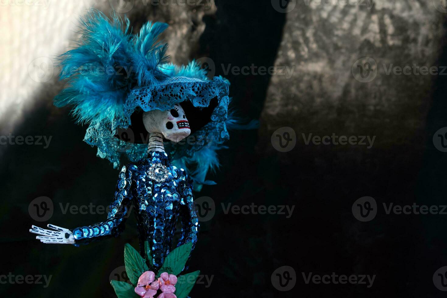 skull or catrina with elegant blue dress on day of the dead photo