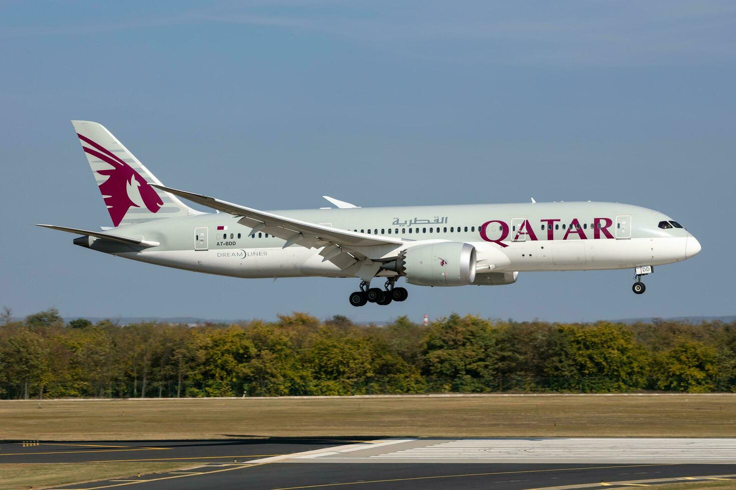 Qatar Airways Boeing 787-8 Dreamliner passenger plane at airport. Aviation and aircraft. Air transport and travel. International transportation. Fly and flying. photo