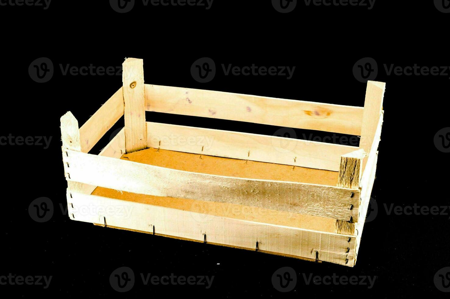 a wooden crate on a black background photo