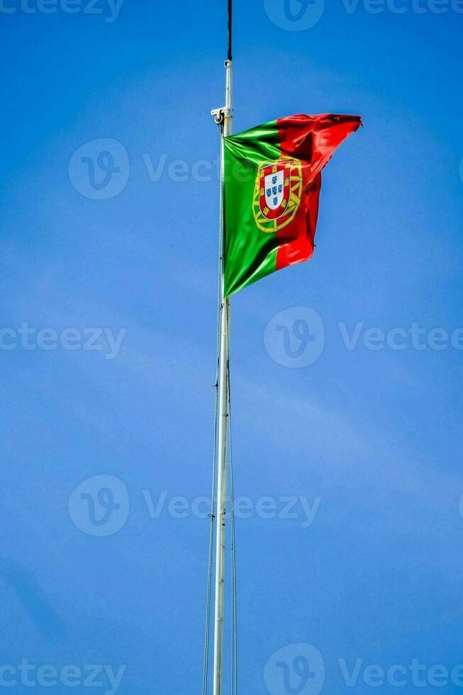 portugal flag on the flagpole photo