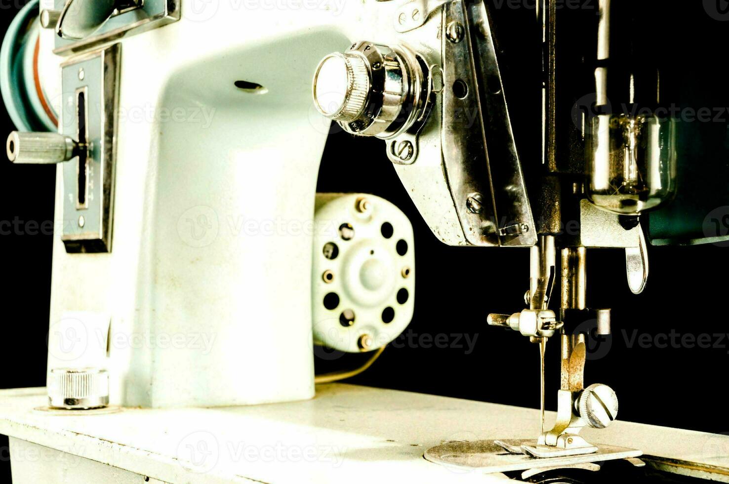 a close up of a sewing machine photo