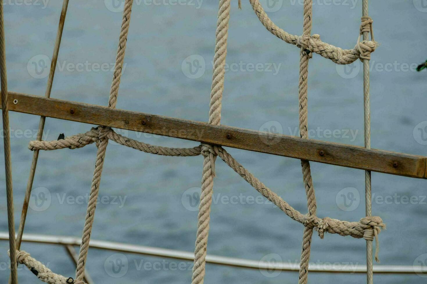 a rope ladder on a sailboat photo