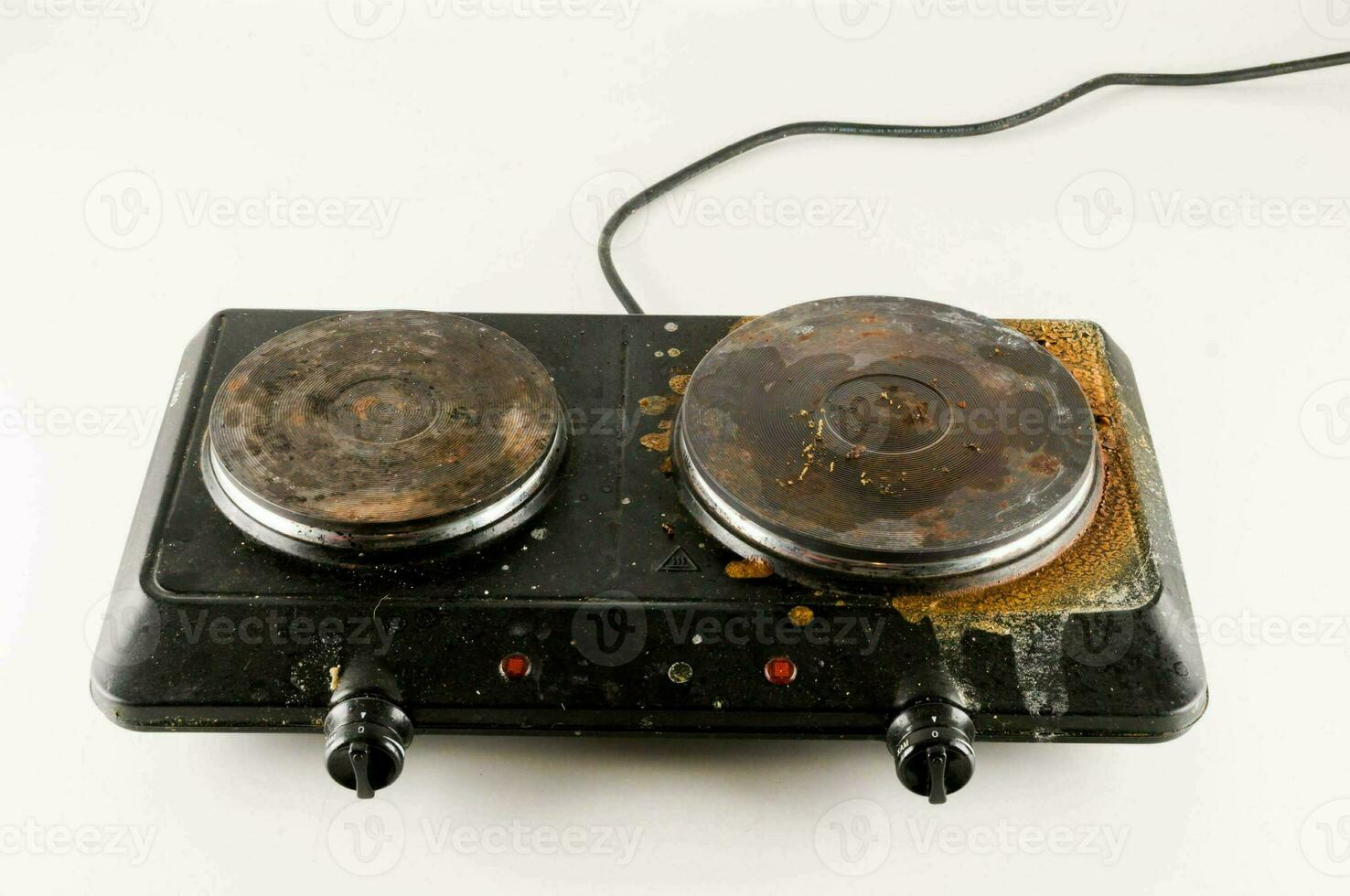 an old stove top with two burners on it photo