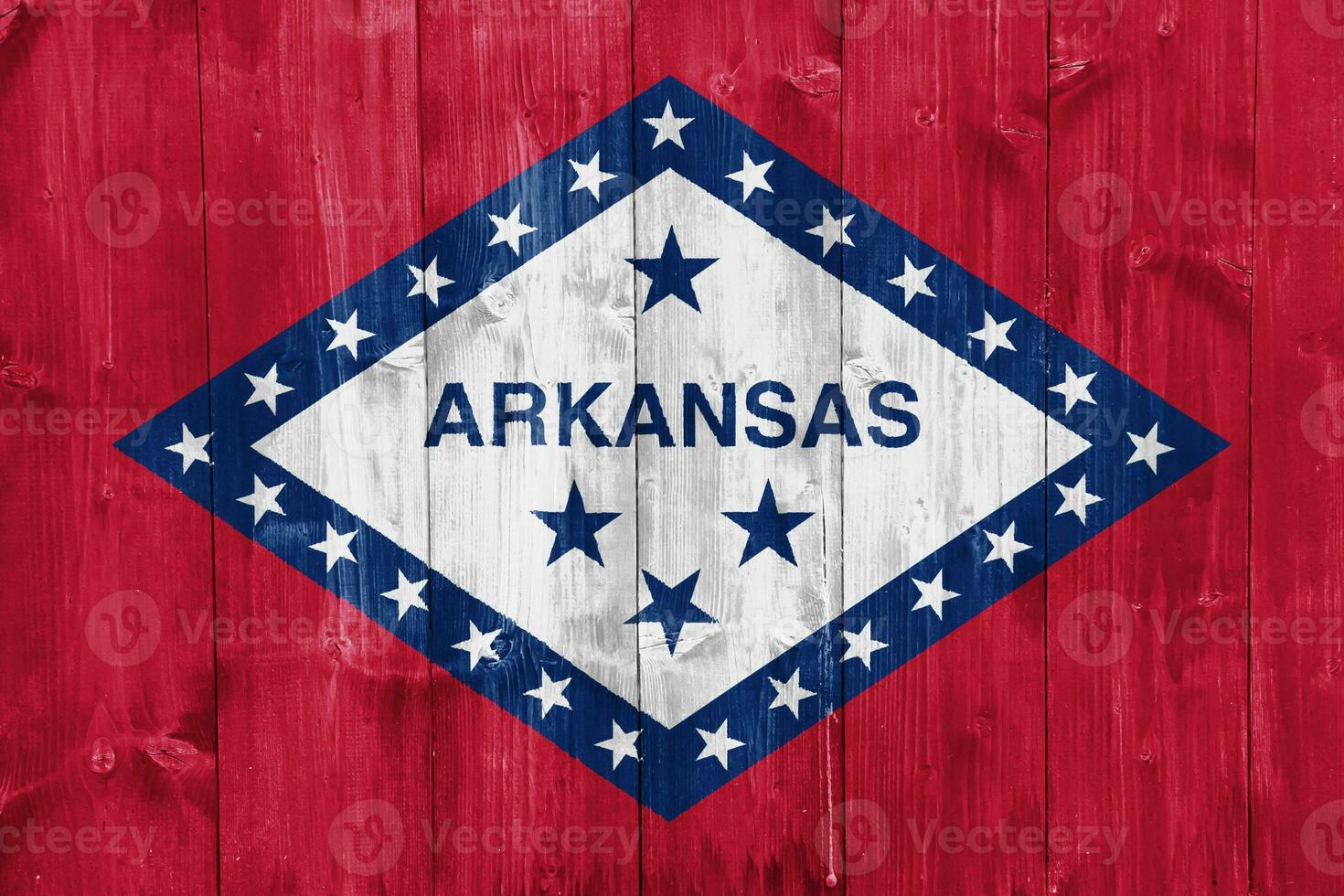 bandera de Arkansas estado Estados Unidos bandera en un texturizado antecedentes. concepto collage. foto