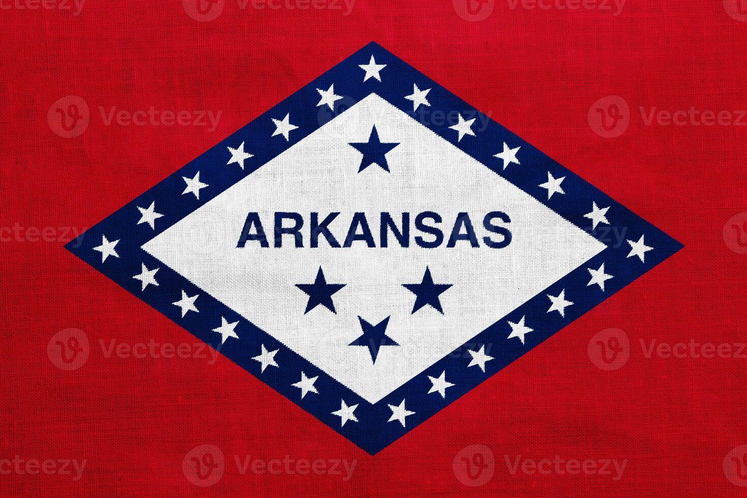 Flag of Arkansas state USA flag on a textured background. Concept collage. photo