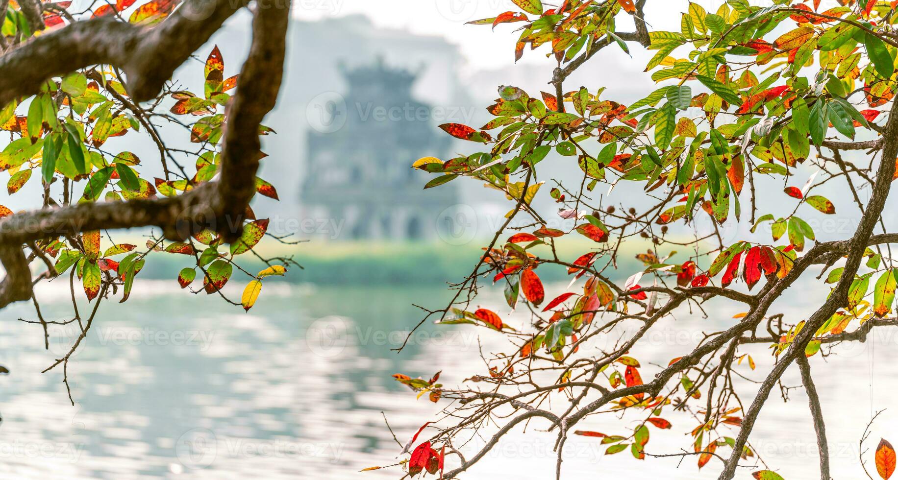 Hoan Kiem Lake - Ho Guom or Sword lake in the center of Hanoi in the fog in the morning. photo