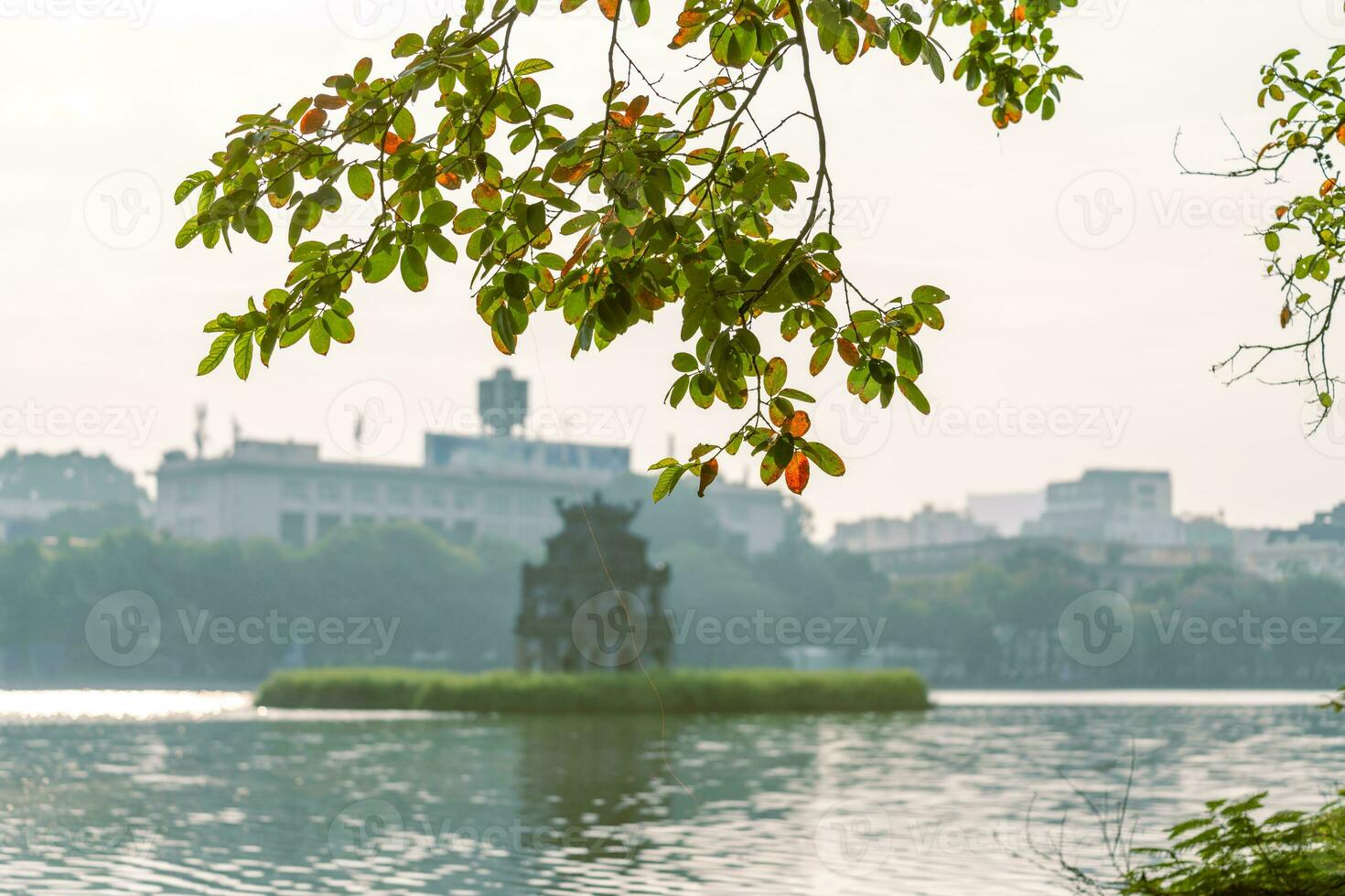 Hoan Kiem Lake - Ho Guom or Sword lake in the center of Hanoi in the fog in the morning. photo