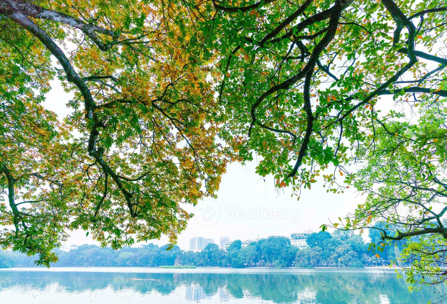 Hoan Kiem Lake - Ho Guom or Sword lake in the center of Hanoi in the fog in the morning. photo