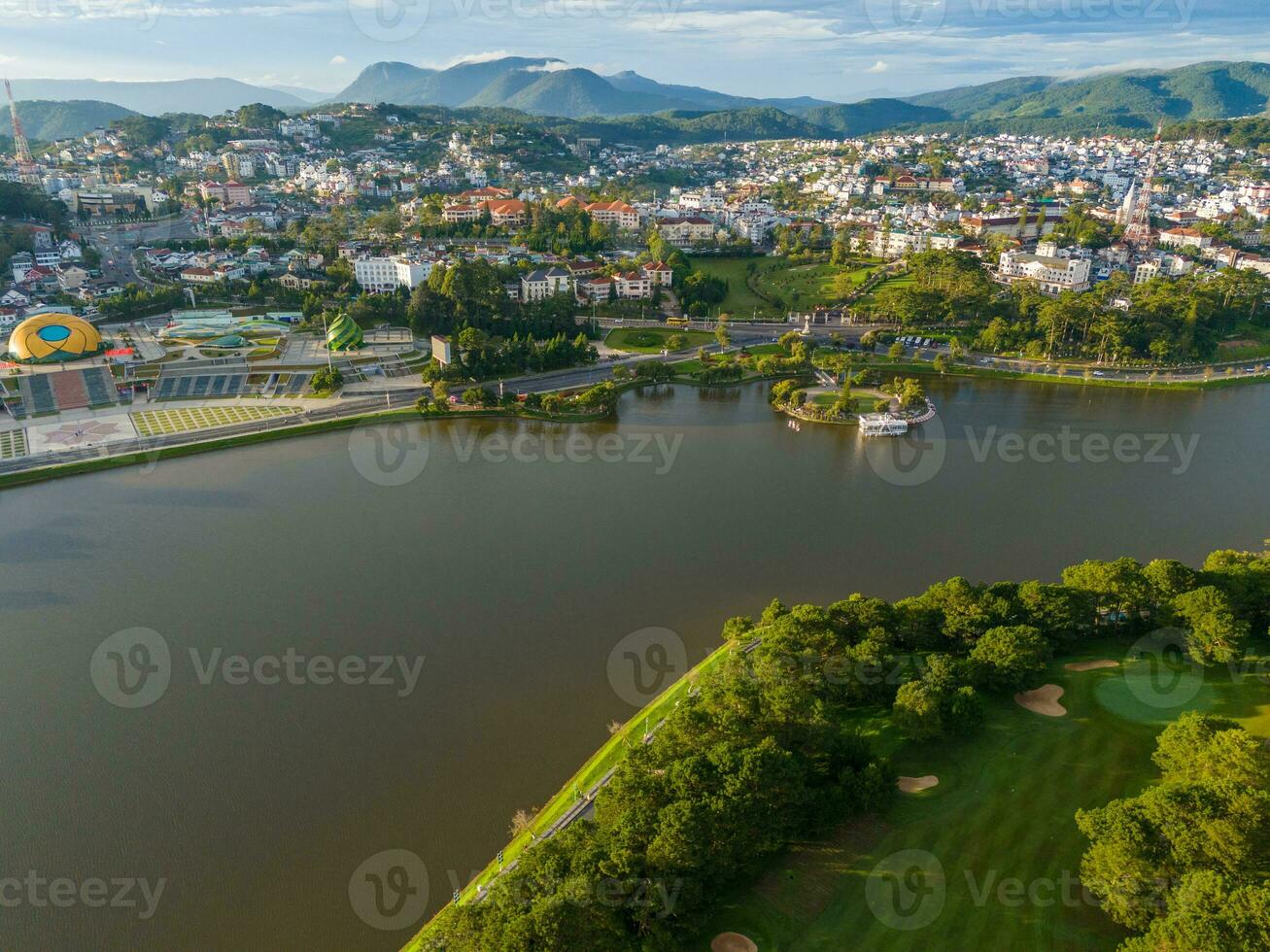 Aerial panorama view of Sunflower Building at Lam Vien Square in Da Lat City. Tourist city in developed Vietnam. Center Square of Da Lat city with Xuan Huong lake photo