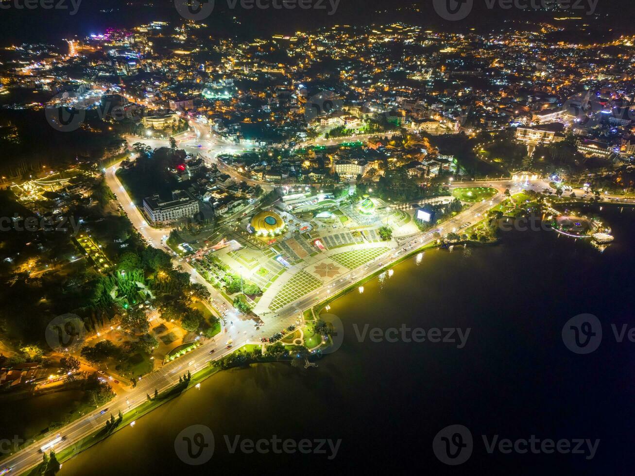 Aerial panorama view of Sunflower Building at Lam Vien Square in Da Lat City. Tourist city in developed Vietnam. Center Square of Da Lat city with Xuan Huong lake photo
