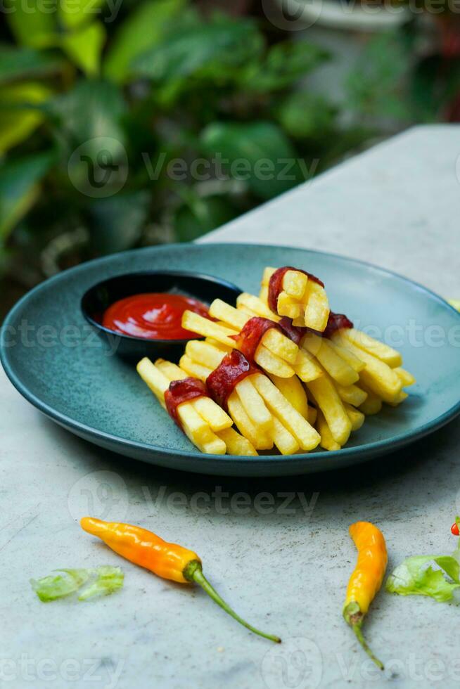 potato slice in plate with sauce photo