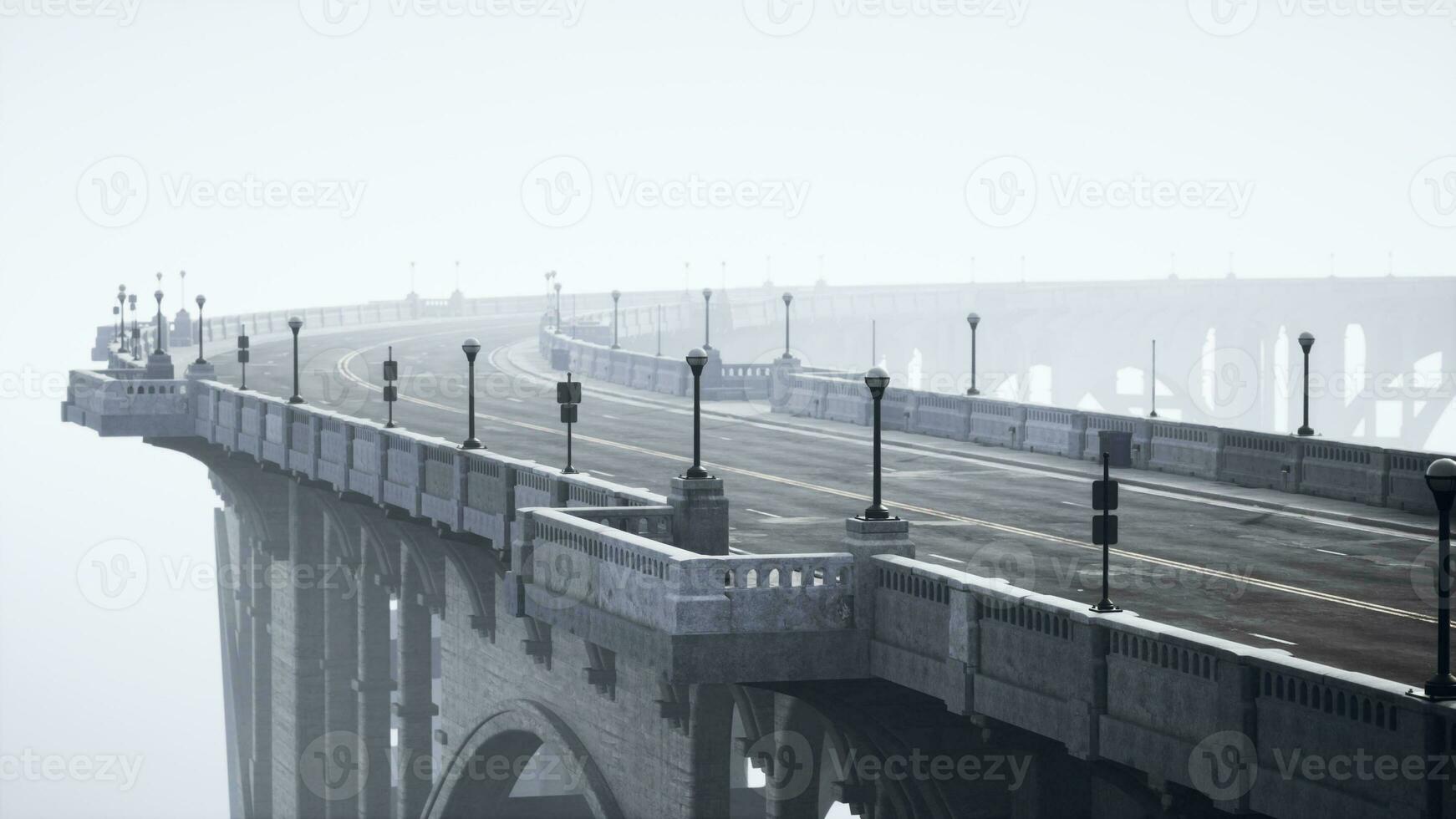 Old empty bridge on a foggy day photo