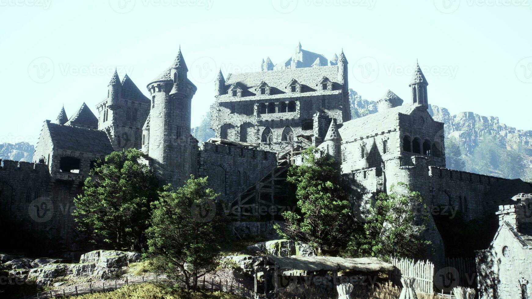 Old ruined castle in the misty mountains photo