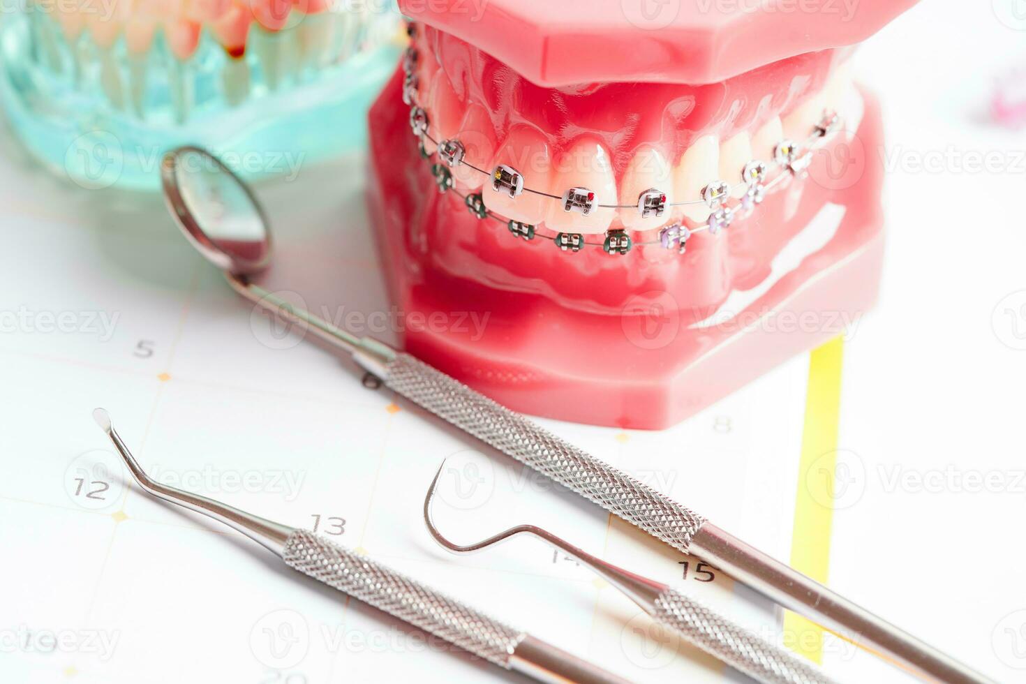 Dental appointment reminder in calendar, healthy teeth, dental health care. photo