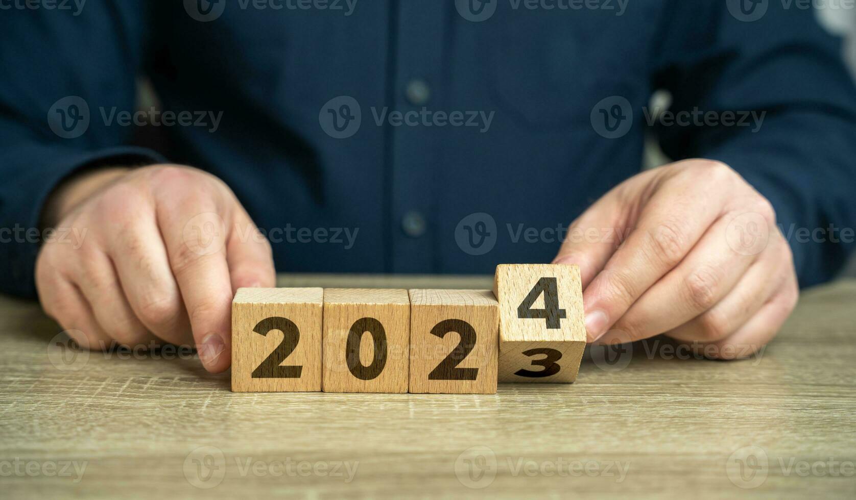 Change of 2023 to 2024. Reflecting on past achievements and experiences while looking forward for opportunities. Embracing new trends, making forecasts, and setting new plans for the upcoming year. photo