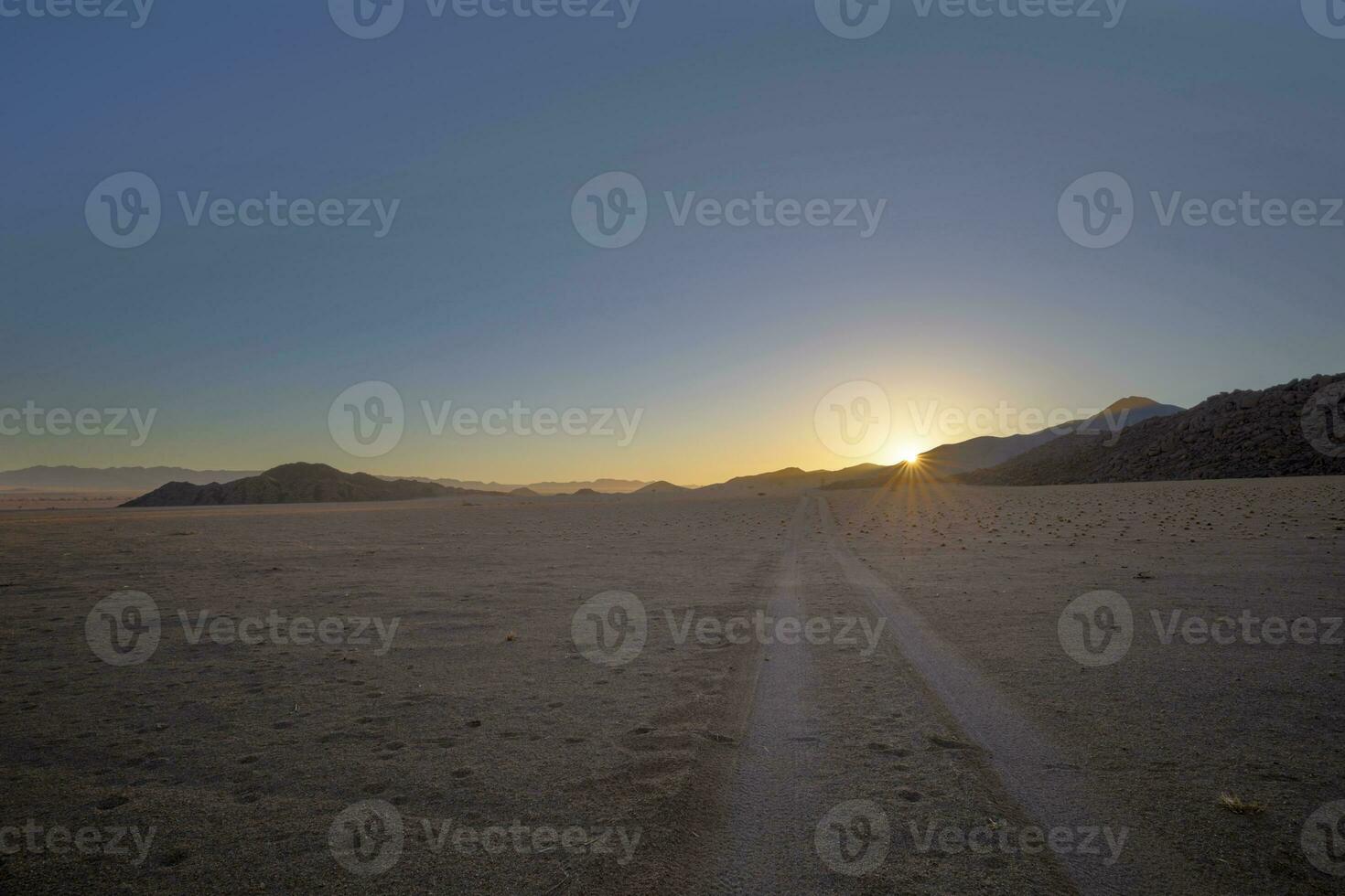 Jeep tracks to sunrise photo