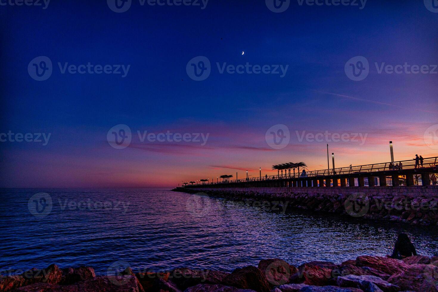 sunset on the seafront in Alicante photo
