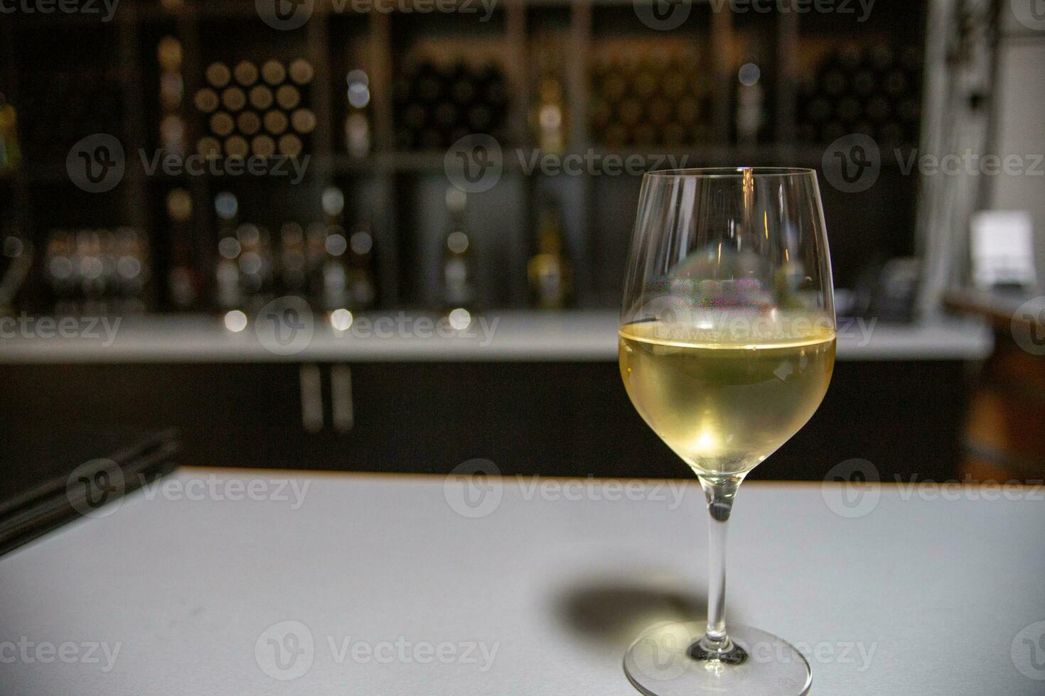 Glass of white wine photo