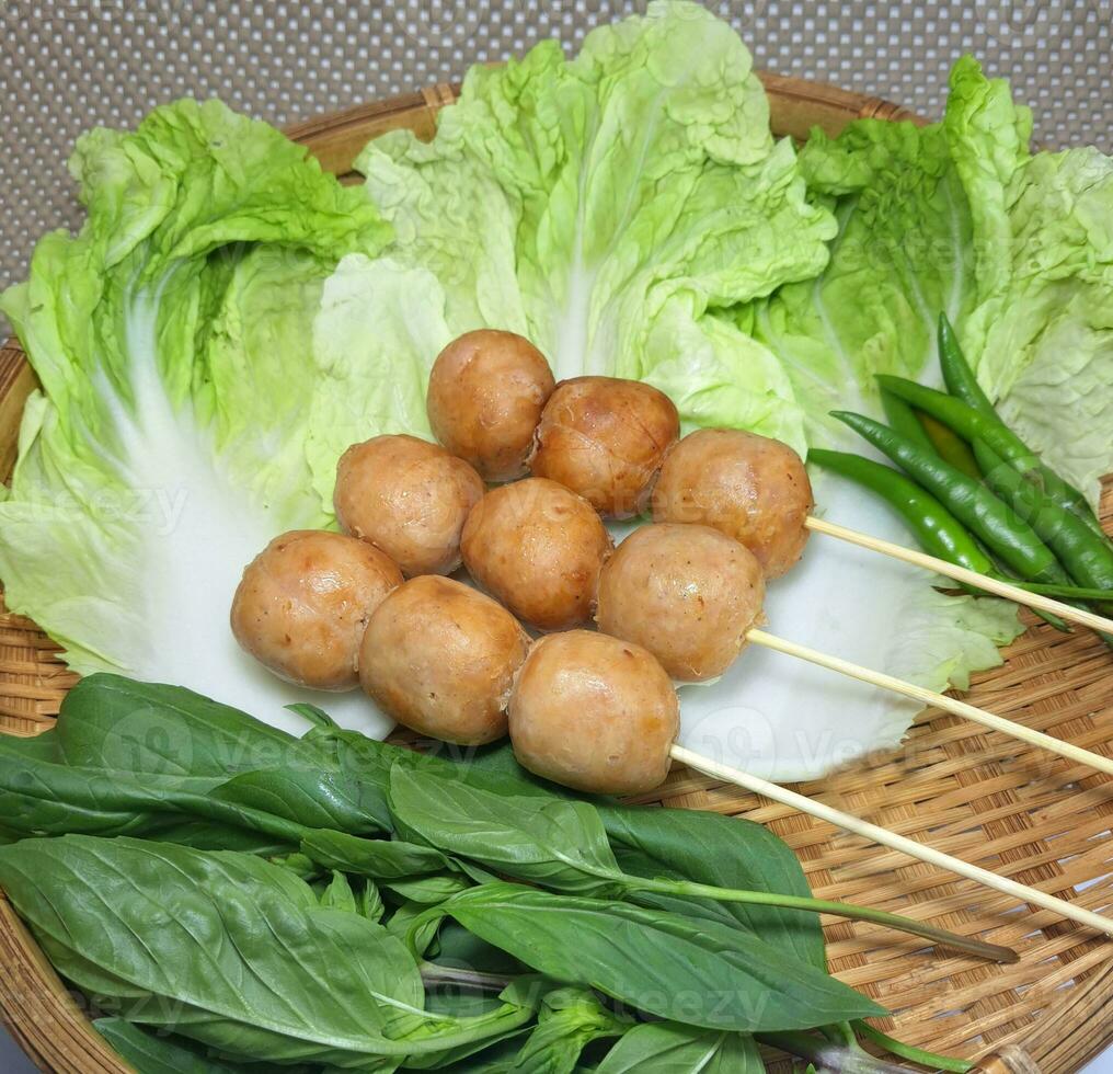 Picture of northeastern sausage with vegetables on the side photo