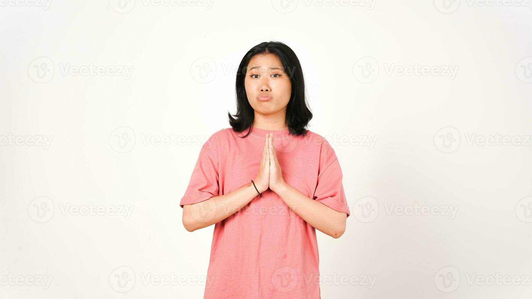 Begging to say sorry Of Beautiful Asian Woman Isolated On White Background photo