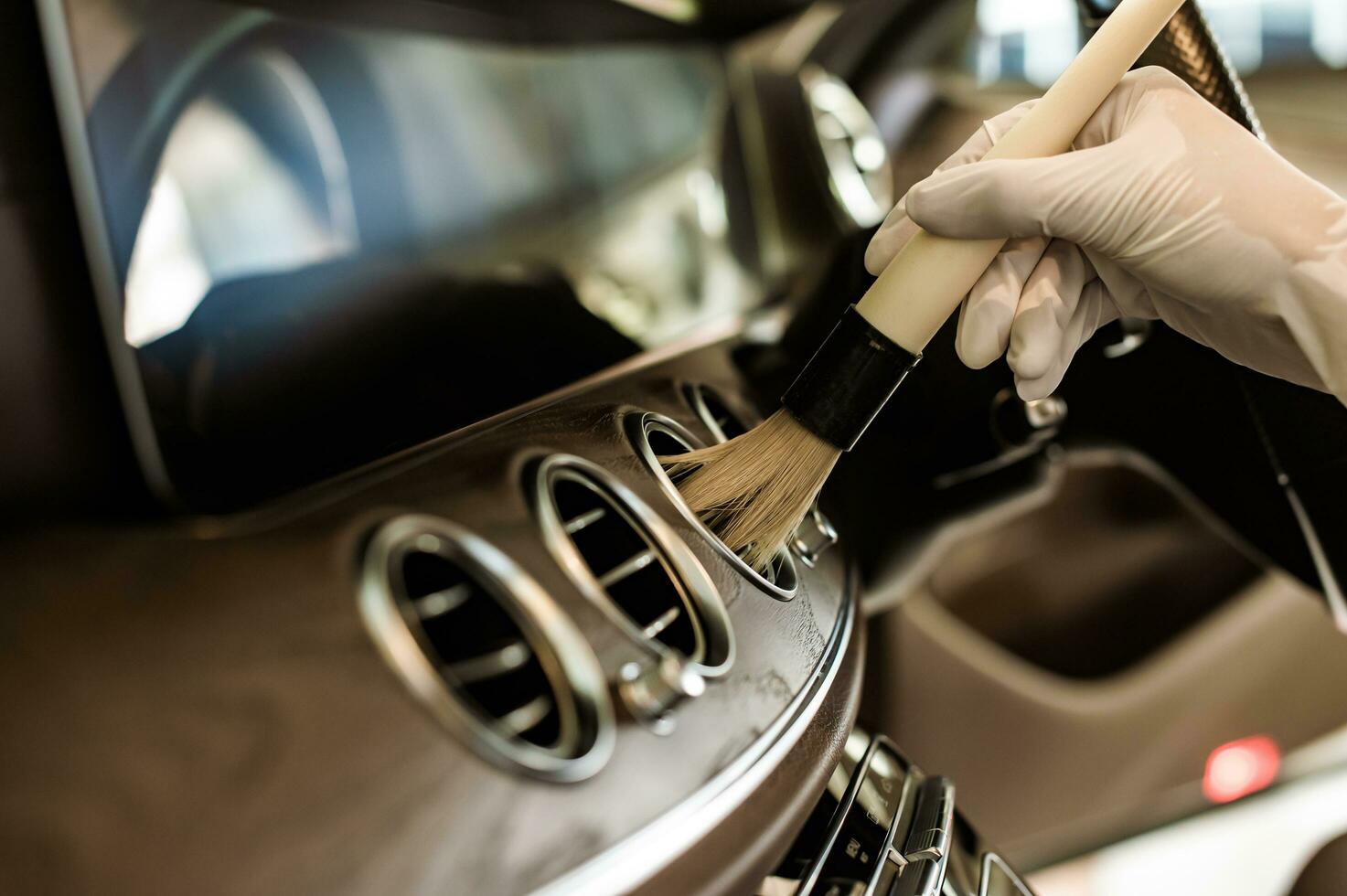 Close up Hand Interior car cleaning photo