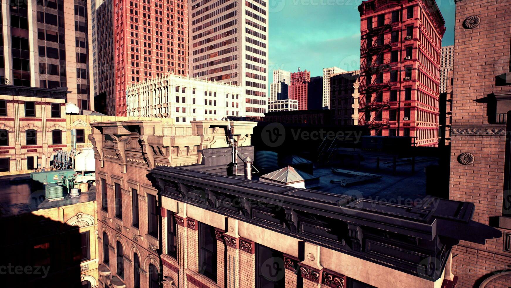 cityscape at sunset, with the roofs of tall buildings in full view photo