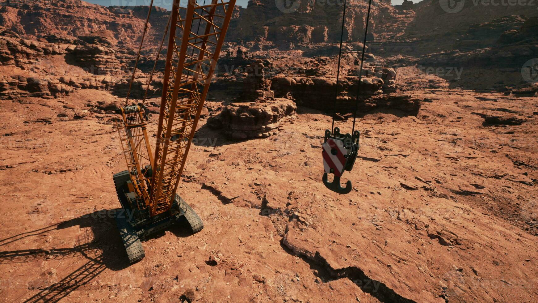 A large crane sitting in the middle of a desert photo