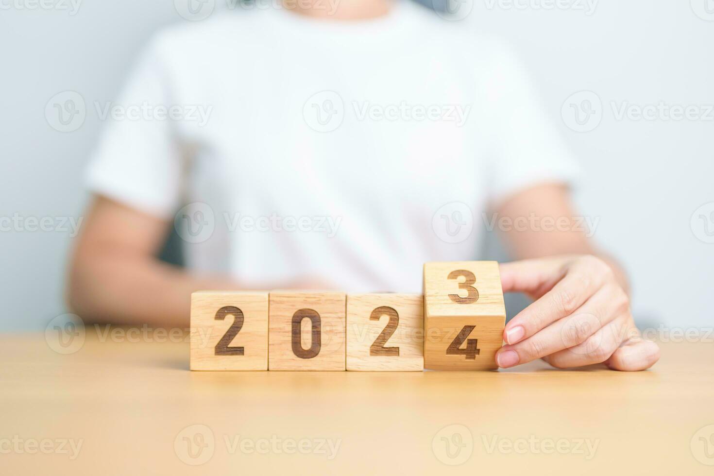 2023 change to 2024 year block on table. goal, Resolution, strategy, plan, start, budget, mission, action, motivation and New Year concepts photo