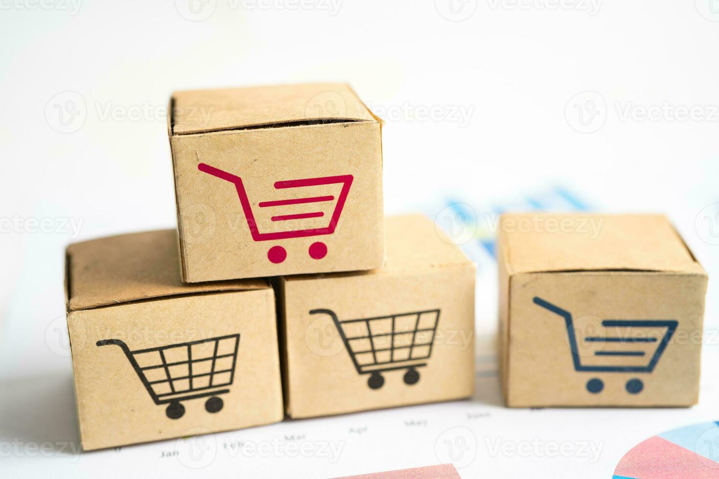 Shopping cart logo on box on graph background. Banking Account, Investment Analytic research data economy, trading, Business import export transportation online company concept. photo