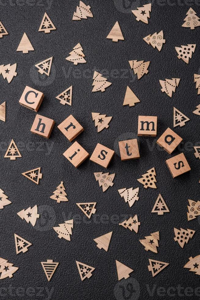 Beautiful Christmas composition with copy space with an inscription in wooden cubes photo