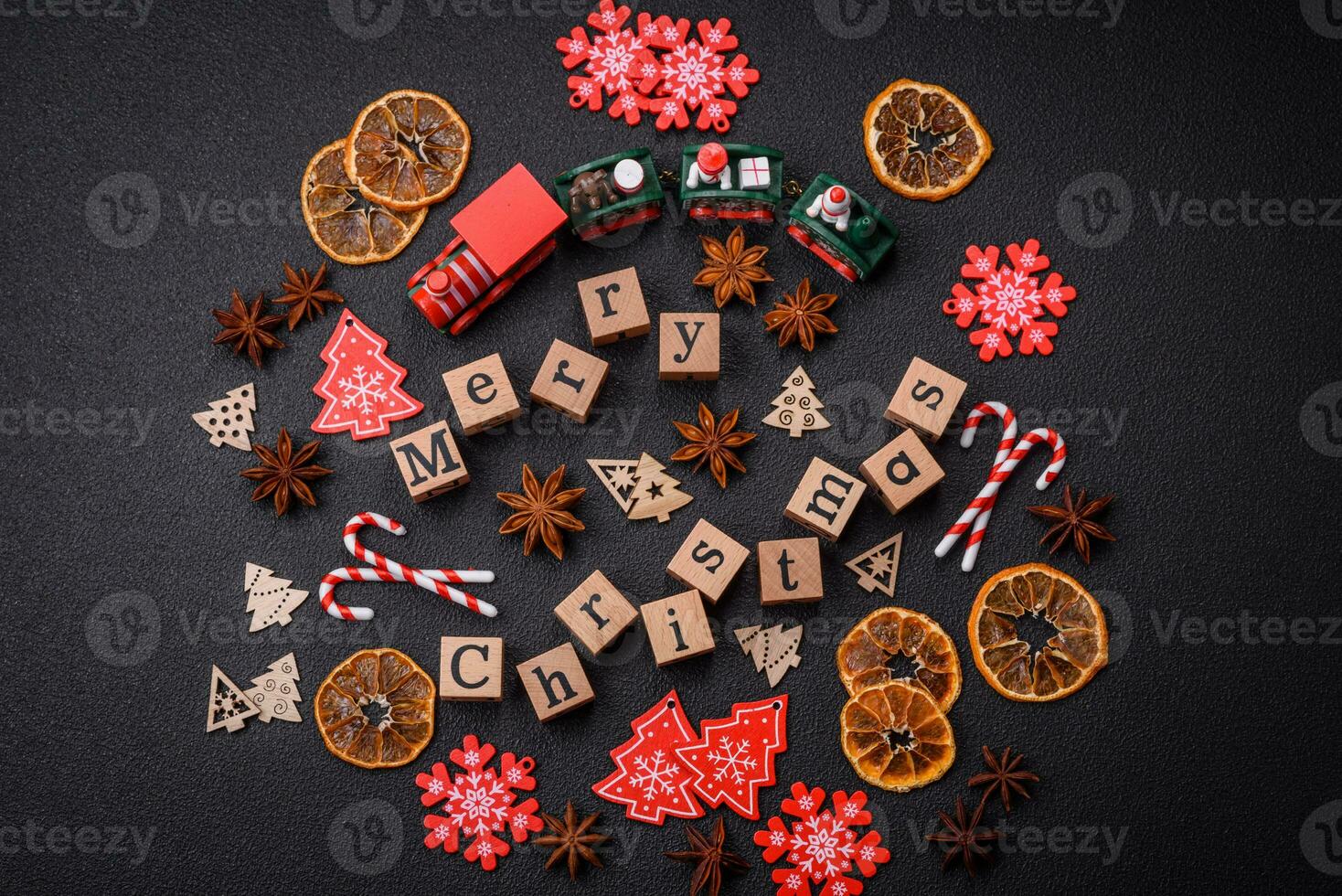 Beautiful Christmas composition with copy space with an inscription in wooden cubes photo