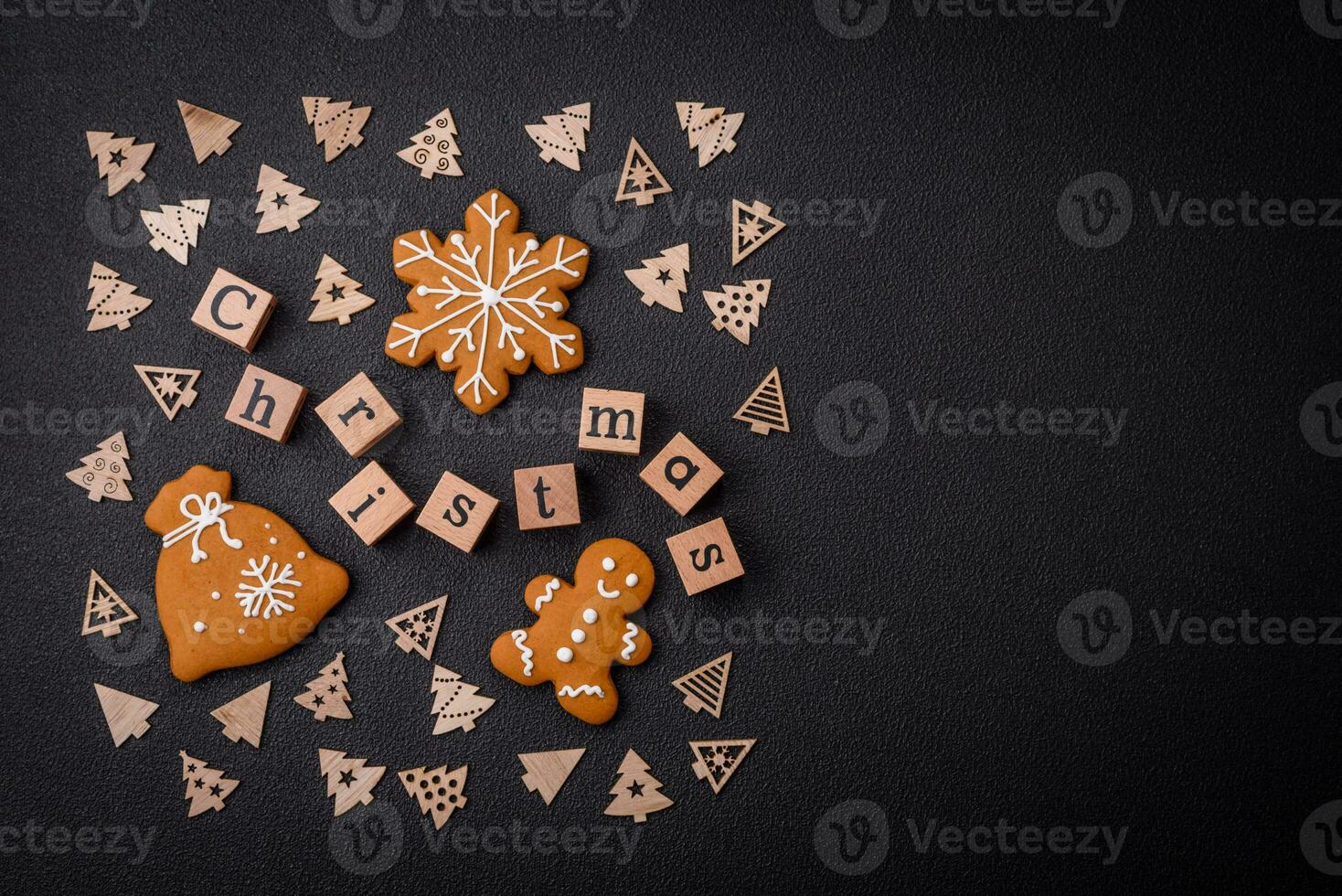 Beautiful Christmas composition with copy space with an inscription in wooden cubes photo