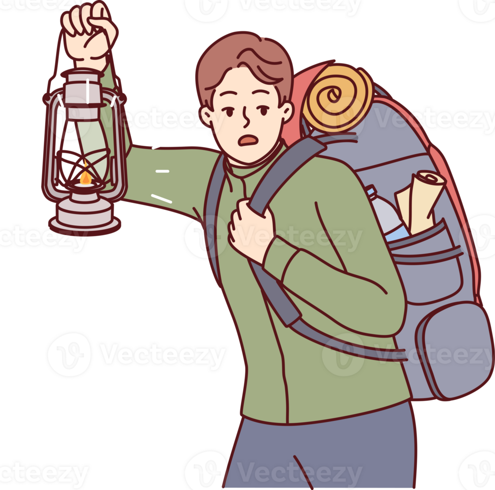 Man is engaged in hiking and carries large backpack on back, holding kerosene lantern to light way in dark png