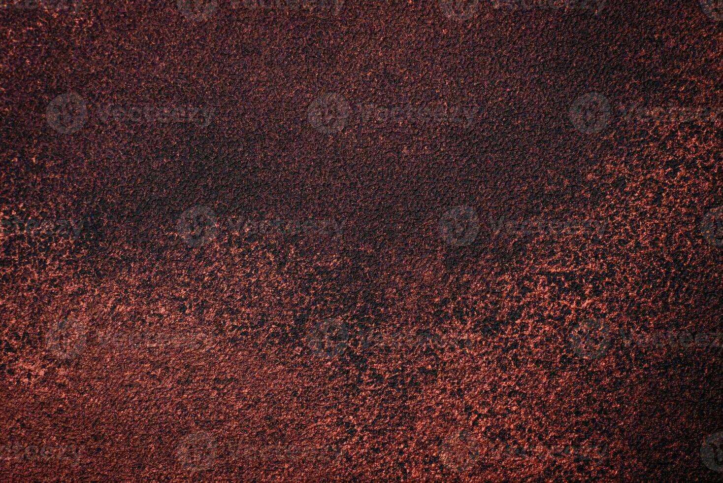 Texture of a concrete wall with cracks and scratches which can be used as a background photo