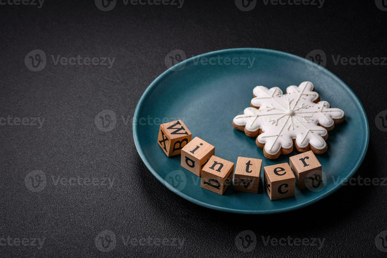 Beautiful Christmas composition with copy space with an inscription in wooden cubes photo