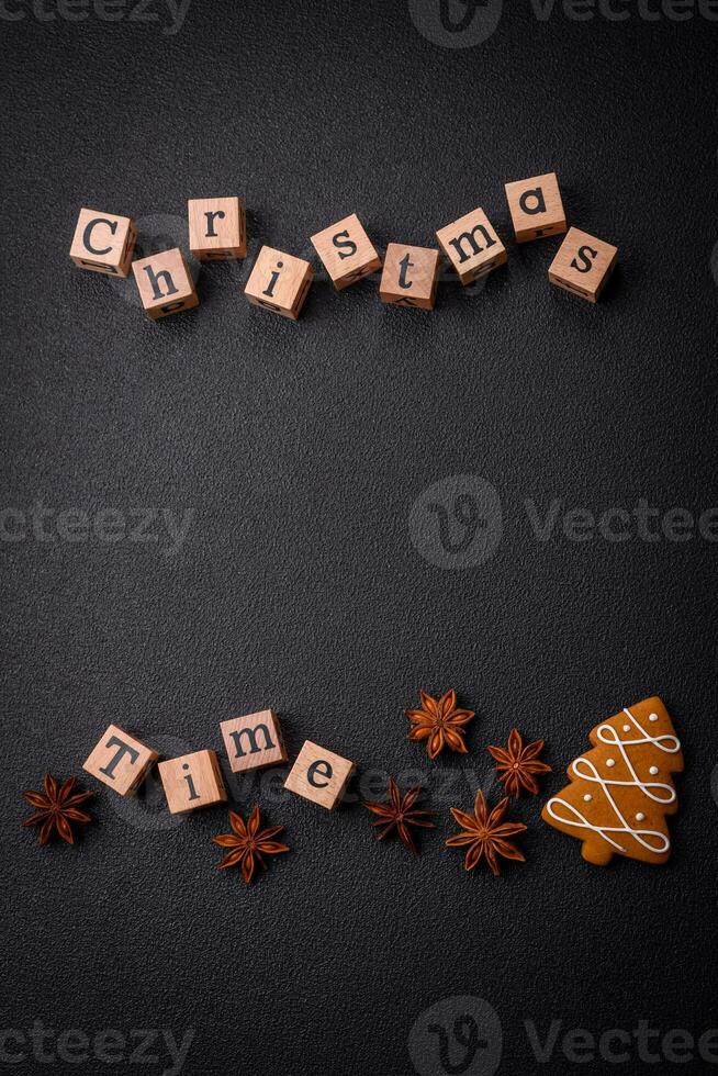 Beautiful Christmas composition with copy space with an inscription in wooden cubes photo