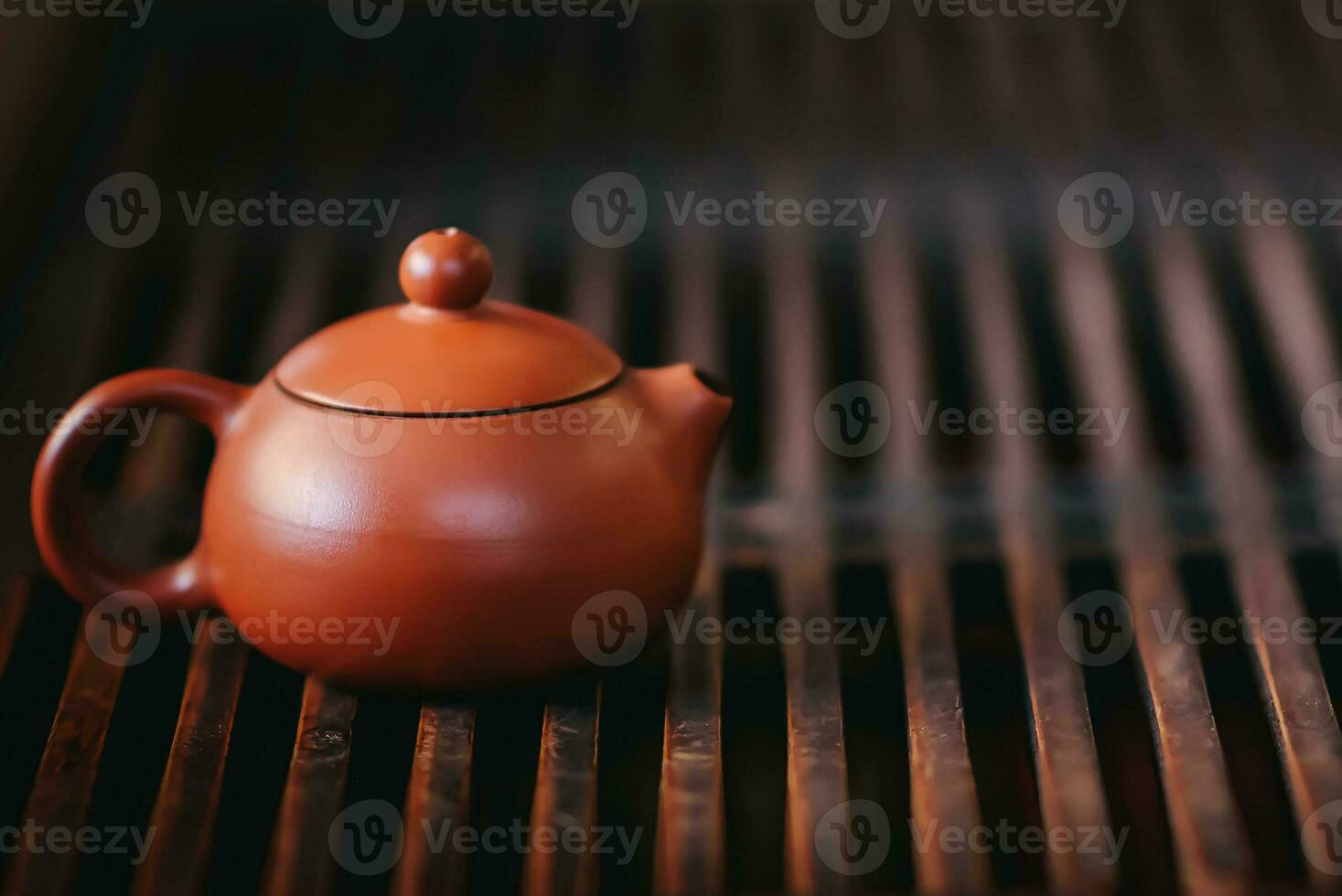 The teapot is on the tea table photo