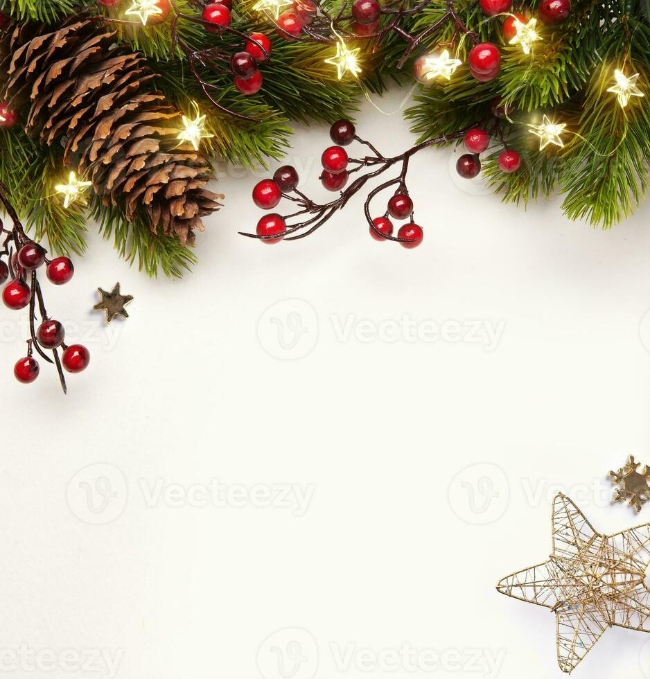 Art Christmas banner or greeting cards design. Background Xmas  of sparkling lights garland, with holidays gifts and Christmas tree branch photo