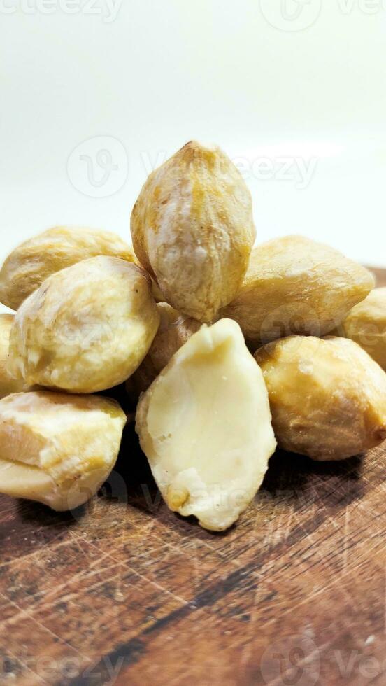 Photo of candlenuts on a white background