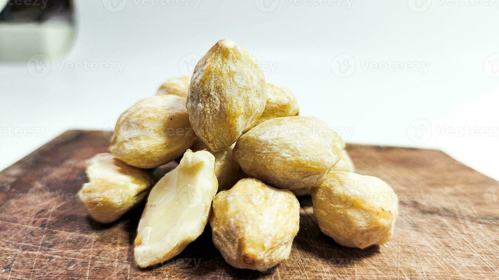 Photo of candlenuts on a white background