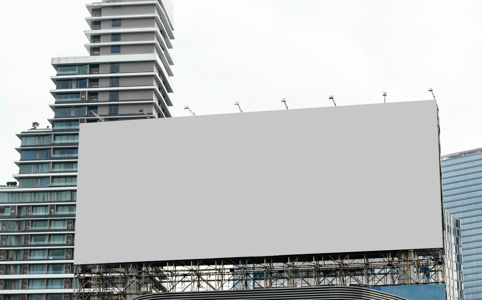 Mock up billboard on rooftop building .clipping path for mockup photo