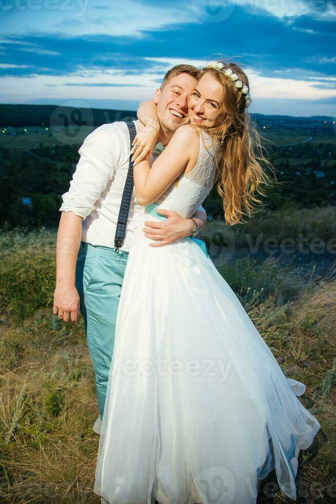 the bride and groom are photographed on the nature photo